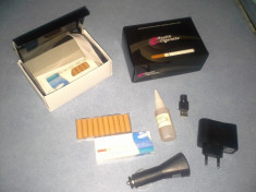 Tigare electronica + 10 filtre + solutie 30 ml aromata , set NOU foto