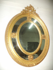 Oglinda superba de dimensiuni mari in stil francez imbracata in foita de aur foto