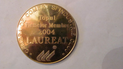 MMM - Medalie &amp;quot;LAUREAT 2004 Topul Firmelor Membre Camera de Comert Cluj&amp;quot; bronz foto