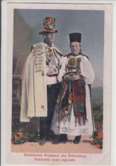 PORT POPULAR DIN TRANSILVANIA FAMILIE DE SASI IN COSTUME TRADITIONALE foto