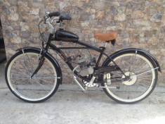 Bicicleta cu motor foto