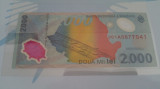 Bancnota 2000 lei aniversara eclipsa 1999