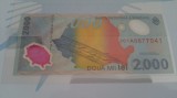 Bancnota 2000 lei aniversara eclipsa 1999 foto