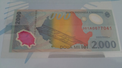 Bancnota 2000 lei aniversara eclipsa 1999 foto