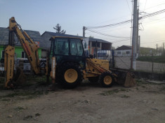 Buldoexcavator Ford New Holland foto