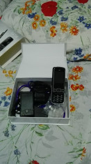 vand telefon dual sim dual stand bye foto