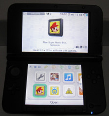 Consola Rosie Portabila NINTENDO 3DS XL + Incarcator + un Joc foto