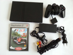 Consola PlayStation 2 + joc F1 + maneta + alimentator + cablu tv originale PS2 foto