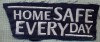 205 -EMBLEMA -HOME SAFE EVERY DAY(SLOGAN FIRMA ASIGURARI) -starea care se vede