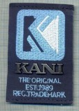 255 -EMBLEMA - KANI - THE ORIGINAL EST 1989 REG. TRADEMARK -starea care se vede