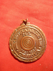 Medalie cu toarta - Dinamoviada de Tir Mai 1987 Craiova ,bronz ,h= 4,5 cm foto