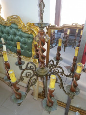 candelabru vechi din bronz si lemn foto