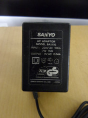 Alimentator Incarcator Sanyo 9V 0,64A Model 9A1110A foto