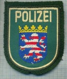 66 - EMBLEMA MANECA -POLITIE -GERMANIA -POLIZEI HESSEN -starea care se vede