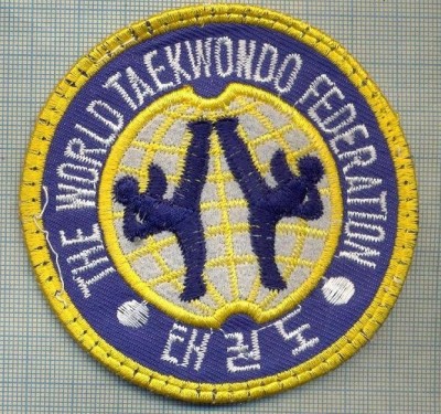 154 -EMBLEMA - SPORTIVA -THE WORLD TAEKWONDO FEDERATION -starea care se vede foto