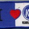 192 -EMBLEMA SPORTIVA-(IUBESC)KSC KARLSRUHE-PENTRU SUPORTERI-starea care se vede
