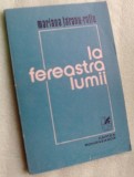Cumpara ieftin MARIANA TARANU-RATIU - LA FEREASTRA LUMII (VERSURI, 1986) [dedicatie / autograf]