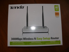 Router model Wireless Tenda foto