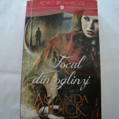 Focul din oglinzi - Amanda Quick