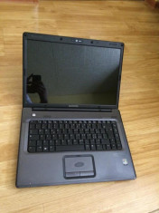 Dezmembrez laptop HP Compaq F700 placa baza defecta (display, tastatura, etc OK foto