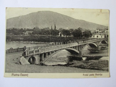 CARTE POSTALA PIATRA NEAMT PODUL PESTE BISTRITA,LIBRARIA V.IONESCU NR.22-1931 foto