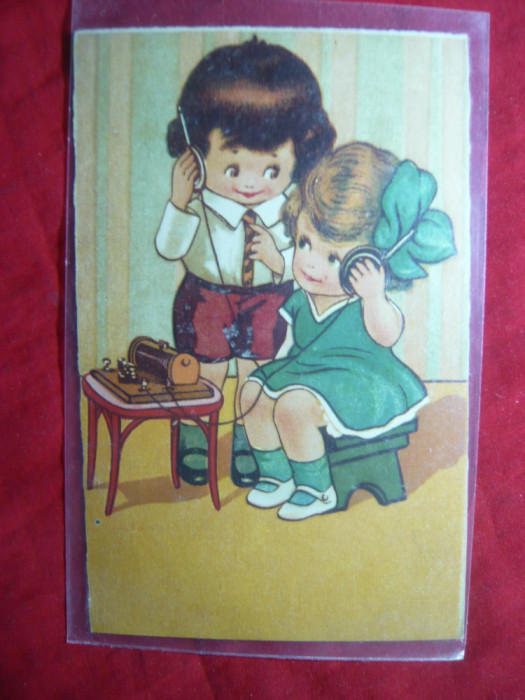 Ilustrata circulata 1931 Fetita si Baietel vorbind la telefon cu casti