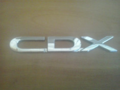 Sigla emblema - CDX - DAEWOO - 110 x 16 mm foto