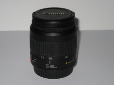 Obiectiv Canon Zoom Lens EF 35-80mm 1:4-5.6 III + capace - Practic nou! foto