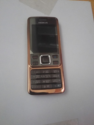 Nokia 6300 maro porsche foto