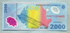 A1247 BANCNOTA-ROMANIA- 2000 LEI- 1999-SERIA004C1123445-starea care se vede foto