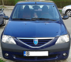 Dacia Logan Kiss Fm, 73000 km, 90 cp, inclusiv anvelope iarna Bridgestone, GPS foto