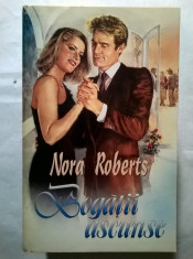 Nora Roberts - Bogatii ascunse foto