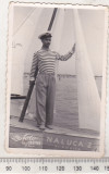 Bnk foto - Vasile Roaita 1959 - Portret de barbat in barca pe malul marii, Alb-Negru, Romania de la 1950, Portrete