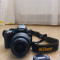 Nikon D5100, 16.2MP + Obiectiv Nikon 18-55mm VR + Geanta foto Nikon