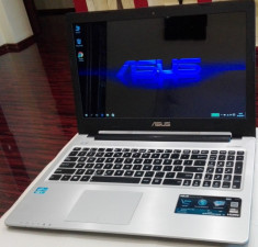 Asus K56-Intel i7-3517U-2.40Ghz-Ram 8GB-SSD 256GB+HDD-15,6 HD display foto