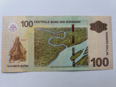 Suriname 100 dollari 2004 foto