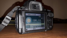 Nikon D5100 + Obiectiv Nikon 18 - 55 mm + 2 acumulatori foto
