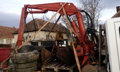 Incarcator de gunoi foto