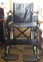 Scaun cu rotile pentru persoana cu handicap, nou, pliabil foto