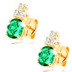 Cercei din aur galben de 14K - smarald verde oval, trei zirconii transparente foto mare Cercei din aur galben de 14K - smarald verde oval, trei zirconii transparente foto mare