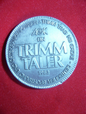 Trimm Taler 1982 ,metal alb Germania foto