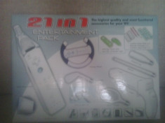 Set 21 accesorii penttru Nintendo Wii Remote si nunchuck - Volan, Pistol, etc foto