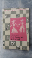 Tricotaje de mana foto