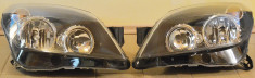Faruri originale Opel Astra H, matuite, zgariate, o clema rupta-120 RON 2buc foto