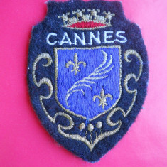 HOPCT EMBLEMA FRANTA CANNES D= 70/55 MM-MATERIAL TEXTIL