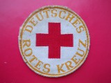 HOPCT EMBLEMA GERMANIA CRUCEA ROSIE GERMANA/ROTES KREUZ D= 80 MM-MATERIAL TEXTIL