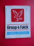 HOPCT EMBLEMA GROUP 4 FALCK VALAHIA D= 80/63 MM-MATERIAL TEXTIL