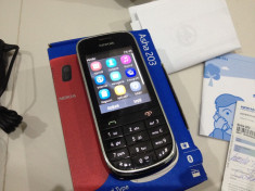 Nokia Asha 203 la cutie,pachet complet in stare foarte buna foto