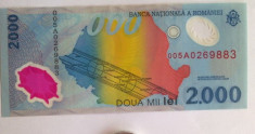 Bancnota de 2000 lei cu eclipsa foto