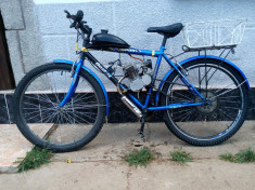 Bicicleta cu motor foto